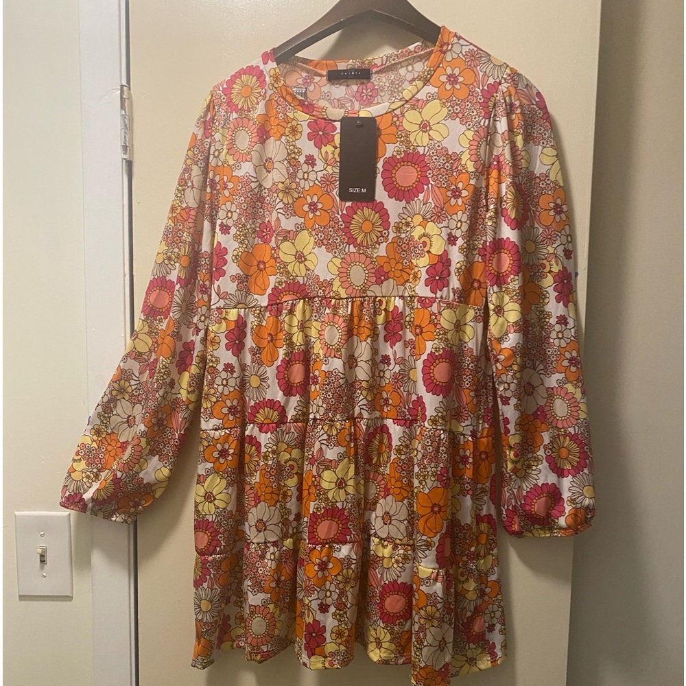 Women’s NWT Floral Baby doll Dress Size Med.